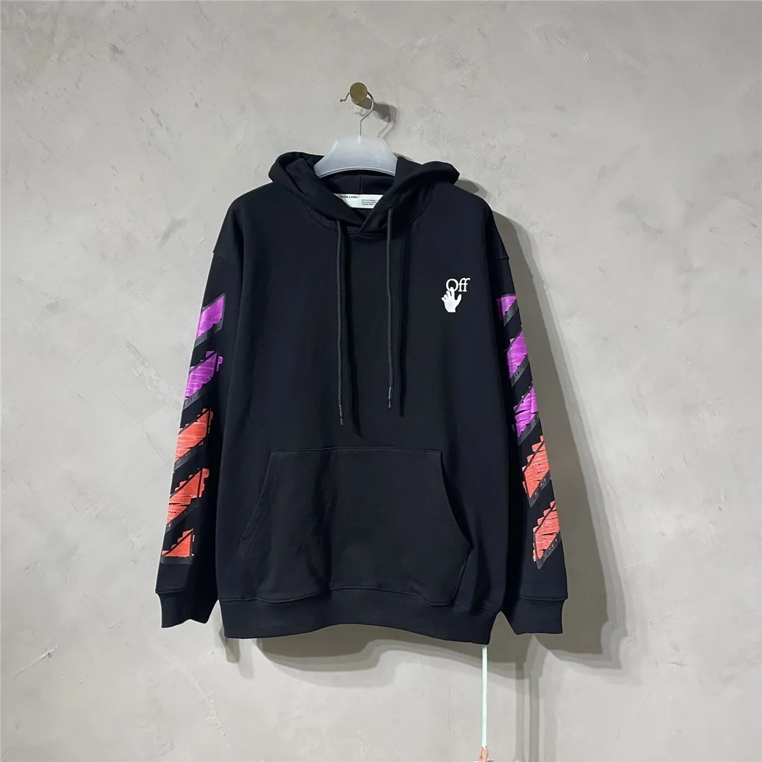 The top tested version OFFWHITE OW marker pen purple orange graffiti arrow same style pure cotton loose pullover round neck zipper jacket sweatshirt for male and female couples The craftsmanship of this model can be said to be very difficult. There is a direct comparison between our home and many versions on the market. You can more clearly distinguish between good and bad just by looking at the prints. This printing uses Kornit's digital direct-injection process. The entire printing effect is like drawing lines with a marker pen. The imitation effect can achieve the same visual effect as the real thing. The main reason is that the color transition of this printing is too small, which makes it impossible to directly copy the pattern when scanning. The image must be manually enlarged more than 40 times, and then adjusted bit by bit to add a soft color (white) effect. The fabric is made of 480g large fish scale pure cotton terry dyed in a vat, which is a big launch and has a full drape. Full set of customized accessories, washed, labeled. Guaranteed to be the top product on the market.  Color: Black Size: XS-L Size Chart